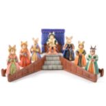 A Royal Doulton, Bunnykins set, Henry VIII and his Six Wives, on stand