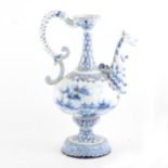A Dutch Delft blue and white ewer, griffin head handle