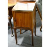 A mahogany bowfront bedside table