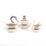 A silver matched three-piece teaset