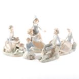 A Lladro figure, Milkmaid and Calf, and four other figures