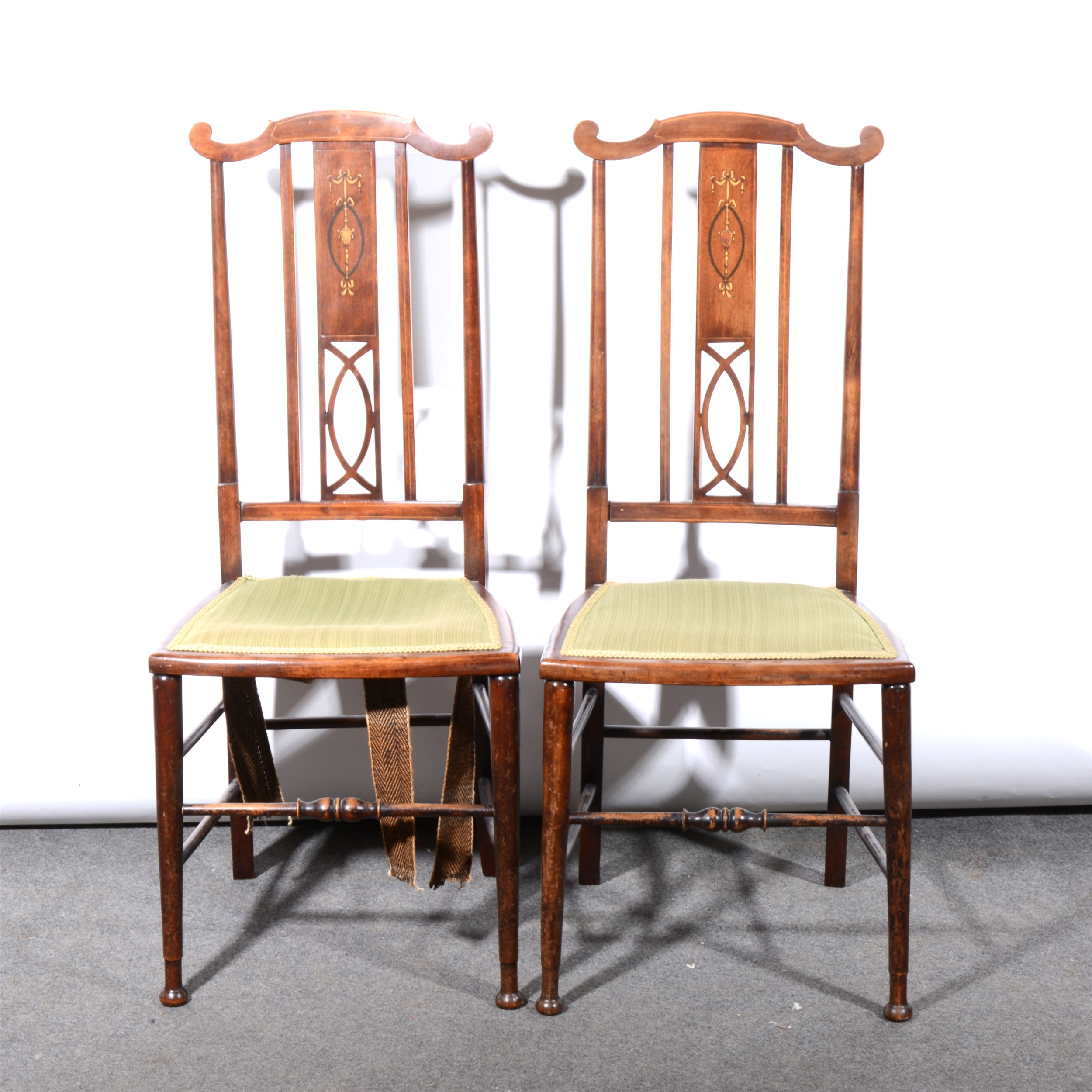 A pair of Edwardian stained wood bedroom chairs