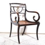 A Regency stained wood elbow chair