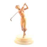 Art Deco gold patinated spelter figure of a lady golfer