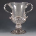 A twin handled glass loving cup, mid 18th Century