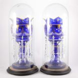 A pair of Victorian blue glass lustre vases