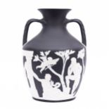 A limited Millennium Edition of the Portland Vase, by Wedgwood.