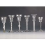 A George III style cordial glass, together with five other glasses.