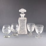 A cut-glass spirit decanter, and other glassware.
