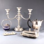 An electroplated oval tray, plated candelabra, and other plated and stainless steel wares