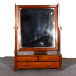 An early Victorian mahogany dressing table mirror,