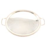 An oval silver twin handled tea tray by A E Jones.