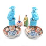 A pair of Chinese turquoise glazed models of Temple Lions, ...