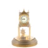 An Anniversary clock, movement signed, Gustav Becker, ...