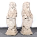 Garden statuary, a pair of stoneware lions.