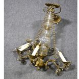A gilt metal four-light chandelier