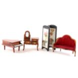 A large quantity of dolls house furniture and accessories.