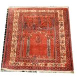 A Turkish prayer rug, red ground, ...