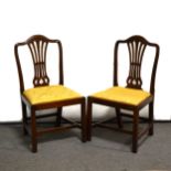 A pair of Hepplewhite style mahogany dining chairs