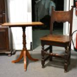 A small oak tilt top table,