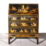 A black lacquered and chinoiserie decorated bureau, ...