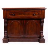 An early Victorian mahogany secretaire