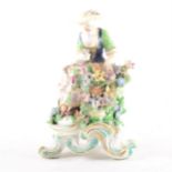 A Derby figure of a young lady, with flowers, ...