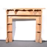 A stripped pine fire surround