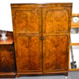 A figured walnut compactum wardrobe, ...