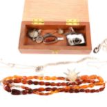 A quantity of silver and modern amber jewellery,