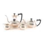 A modern silver four piece tea set by Parkin Silversmiths Ltd