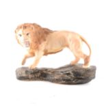 Beswick, Lion on a Rock, model 2554A