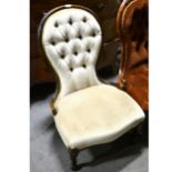 A Victorian stained beechwood nursing chair