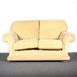 A contemporary two-seater settee, old Gold upholstery, ...
