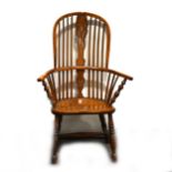 A Victorian yew wood, ash and fruitwood high-back Windsor chair