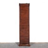 A contemporary tambour-front CD cabinet, ...