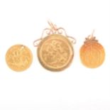 Three de-faced gold coins.