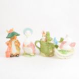 Three contemporary Beatrix Potter inspired money boxes, ...