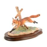 A Border Fine Arts model, Running Fox, ...