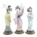 Three Lladro figures of Japanese girls, ...