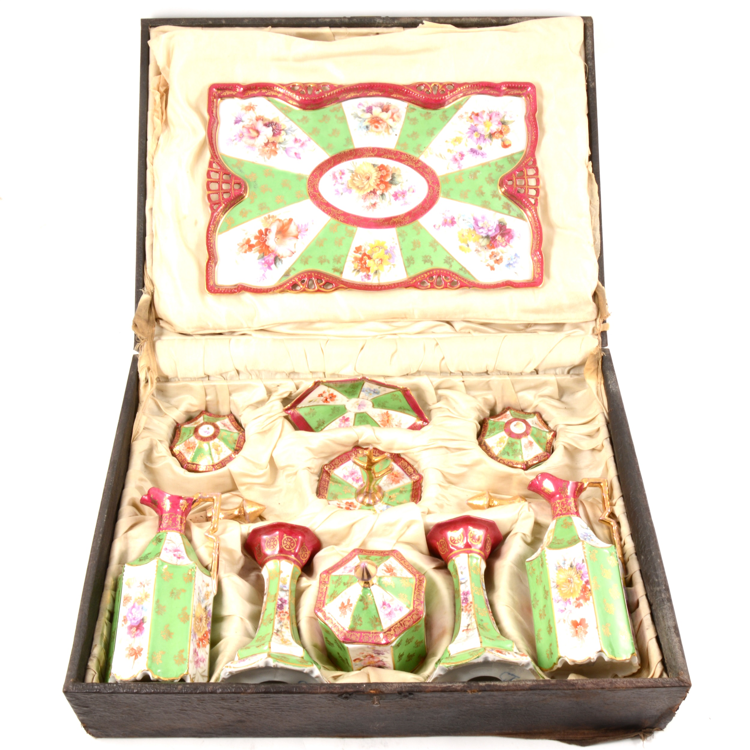 A Viennese porcelain dressing table set, including rectangular tray, a pair of scent bottles, jar,