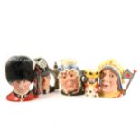 A collection of Royal Doulton character jugs, ...