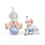 Two Lladro figures of clowns, ...