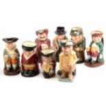 A collection of eight Royal Doulton Toby jugs, including Winston Churchill, ...