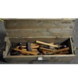 A wooden box with a collection of various hand tools, restored, old plumb bob.