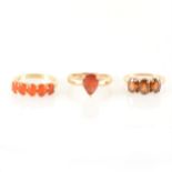 Three gemstone dress rings, zircon, fire opal and andesine