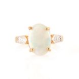 An opal doublet dress ring.