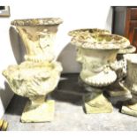 Various reconstituted garden urns and planters
