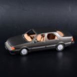 A Somerville metal mock-up prototype of the no.127 Saab 9000 CD, painted grey/brown, with rubber