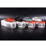 Somerville 1:43 scale white metal models; three no.121 Volvo PV 444A in green, white and black, and